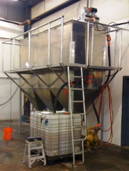 Food Express built an aluminum separation and holding tank and attached a skimmer to clean wastewater from a washing facility.