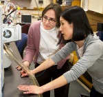 Liz Kujawinski, left, and colleague Melissa Kido Soule work on oil dispersant study in WHOI Fourier-Transform Mass Spectrometry Facility. Photo by Tom Kleindinst, Woods Hole Oceanographic Institution
