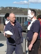 Spooner Industries staff member gets to throw a pie in the face of a plant manager on Red Nose Day.
