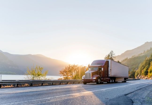 Truck transporting cargo on road