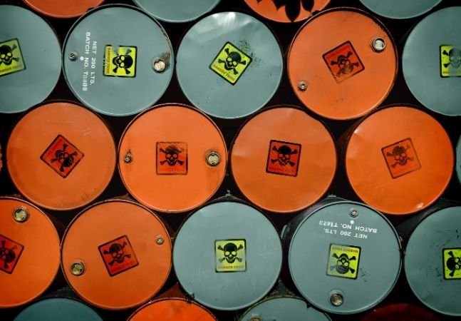 Containers with chemical warning stickers