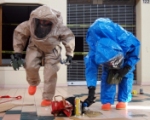 Two members of the 92nd Civil Support Team take a sample of a simulated hazardous substance during training in 2005. The Nevada National Guard was called to assist Las Vegas Metro Police in 2008, with ricin. Photo by Sgt. 1st Class Erick Studenicka 