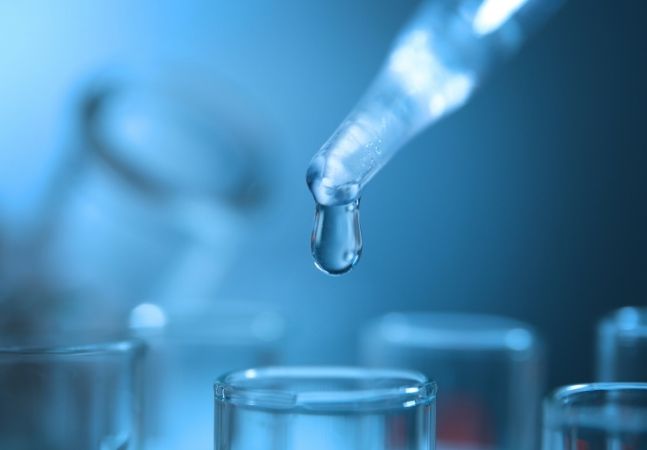 Testing water in laboratory closeup