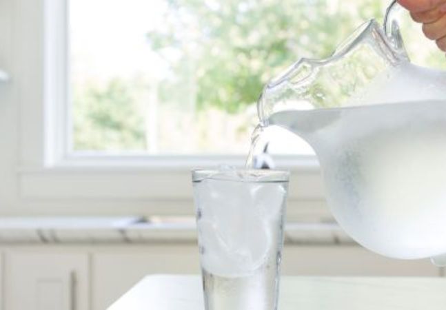 Pitcher Pouring Water