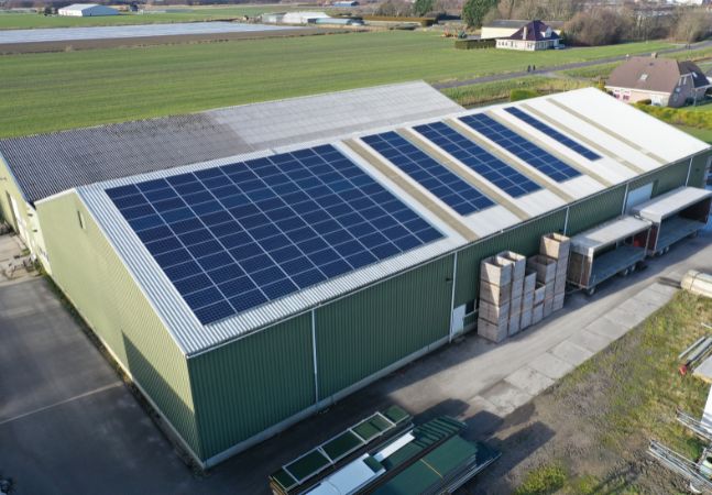 Aerial view of a building with solar panels